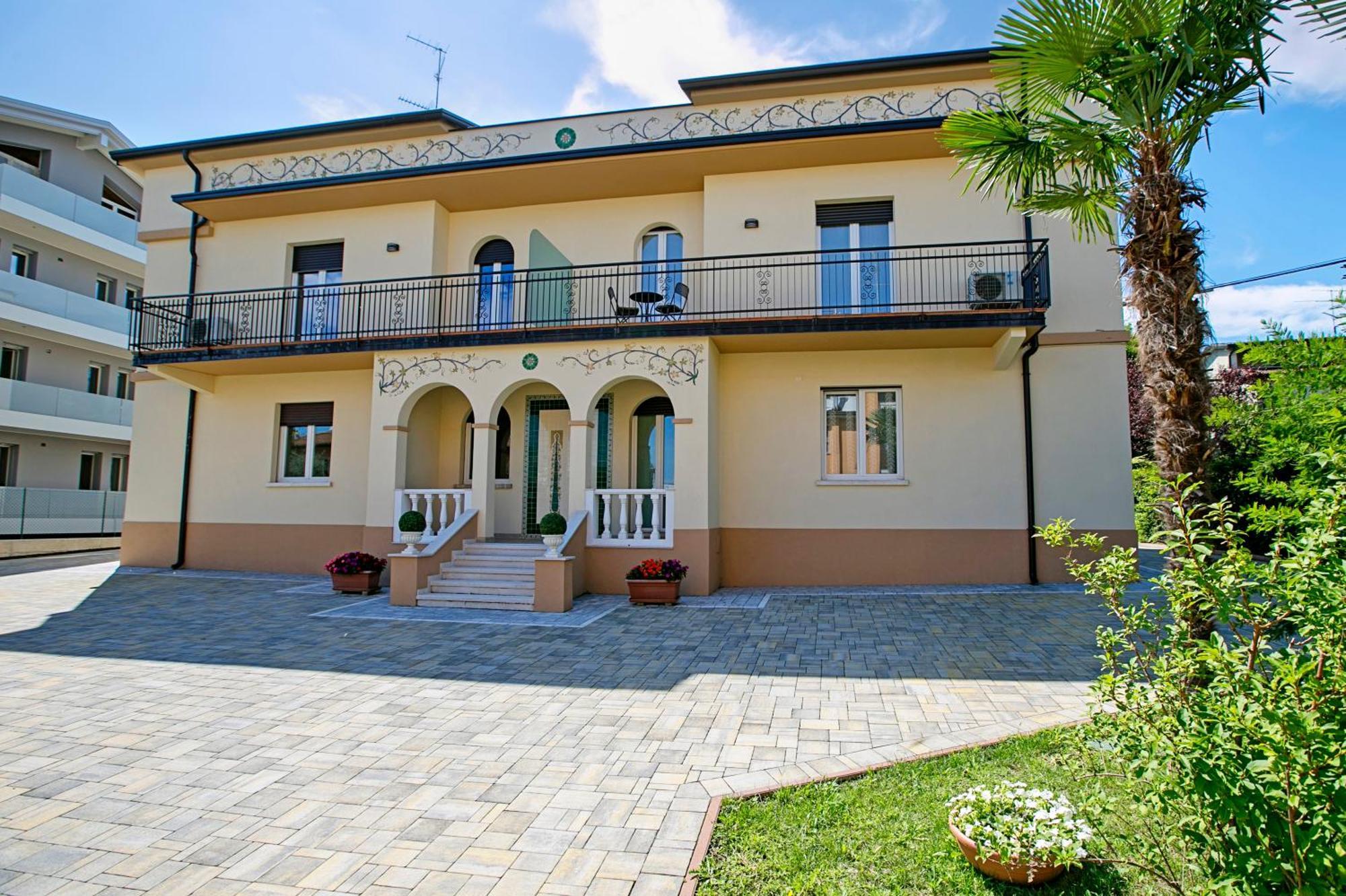 Villa Mimosa - Appartamento 2 - Happy Rentals 代森扎诺-德尔加达 外观 照片